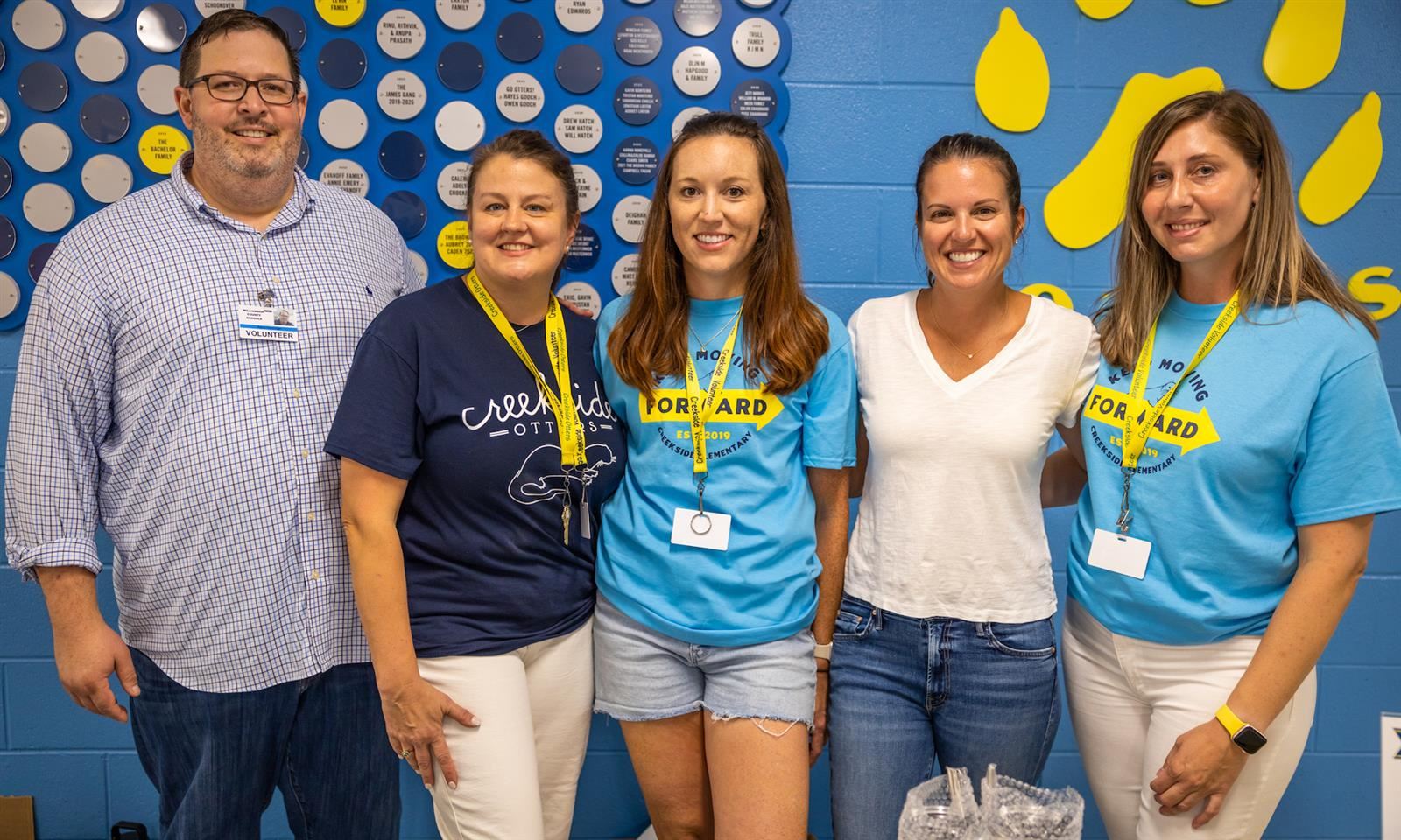 School volunteers smile